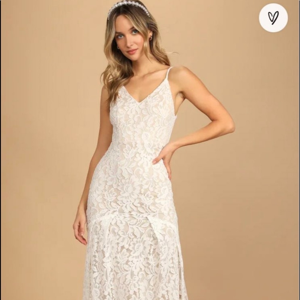 Brand new lulu Flynn dress size large. It’s absolutely beautiful